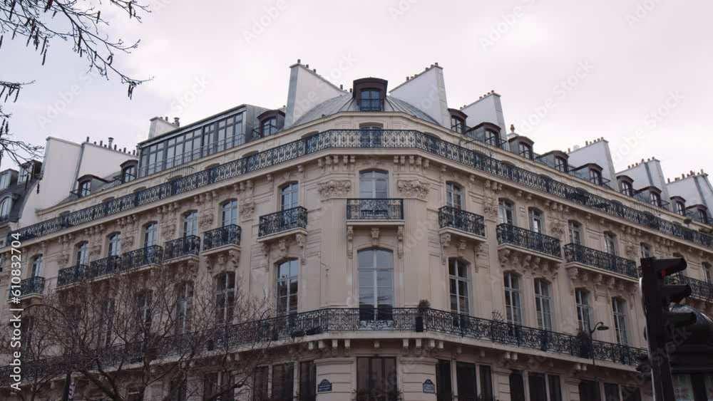 View Of Typical House With Balcony In The City Of Paris, France. Low Angle View Of Typical House With Balcony In The City Of Paris, France. Low Angle