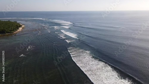 Aerial drone view over ocean waves on Grajagan Bay, G Land, Plengkung Beach, Java, Indonesia photo