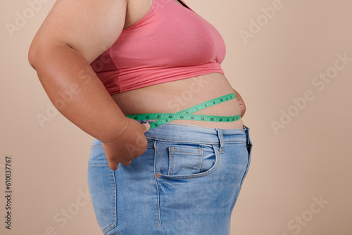 fat woman measuring her stomach, isolate on white background, she wants to lose weight concept. Positive lifestyle., Type with increased fat deposition and fullness