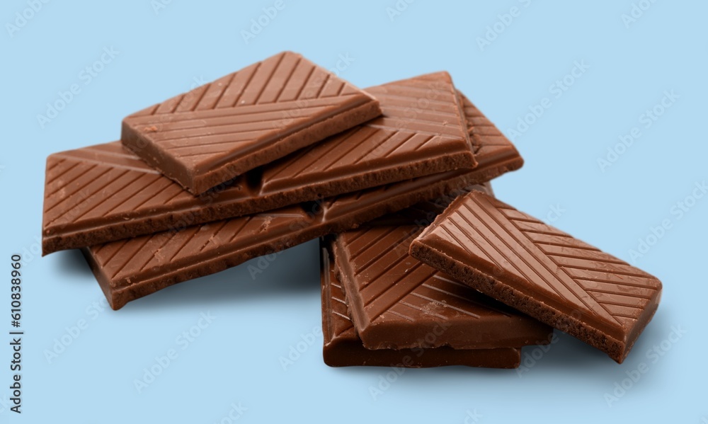 Tasty sweet milk chocolate pieces Tasty sweet milk chocolate pieces