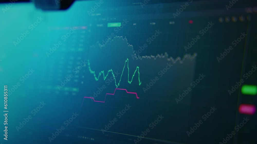 Economic graphics of stocks or currency on display jumps up and down
