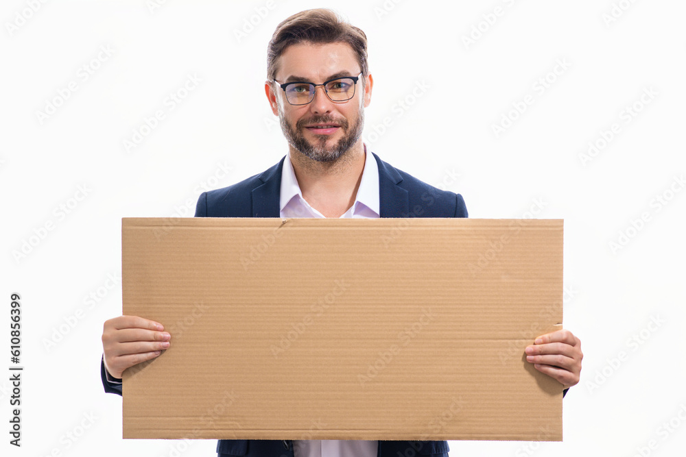Handsome man holds the sign, blank card. Placard ready for your product. Portrait of man showing blank sign board on studio isolated background. Empty blank board. Advertising and copy space concept. Handsome man holds the sign, blank card. Placard ready for your product. Portrait of man showing blank sign board on studio isolated background. Empty blank board. Advertising and copy space concept.
