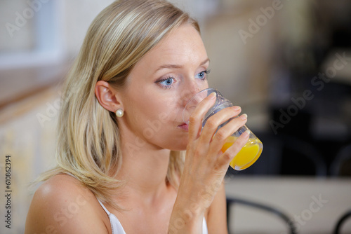 picture of a woman drinking juice