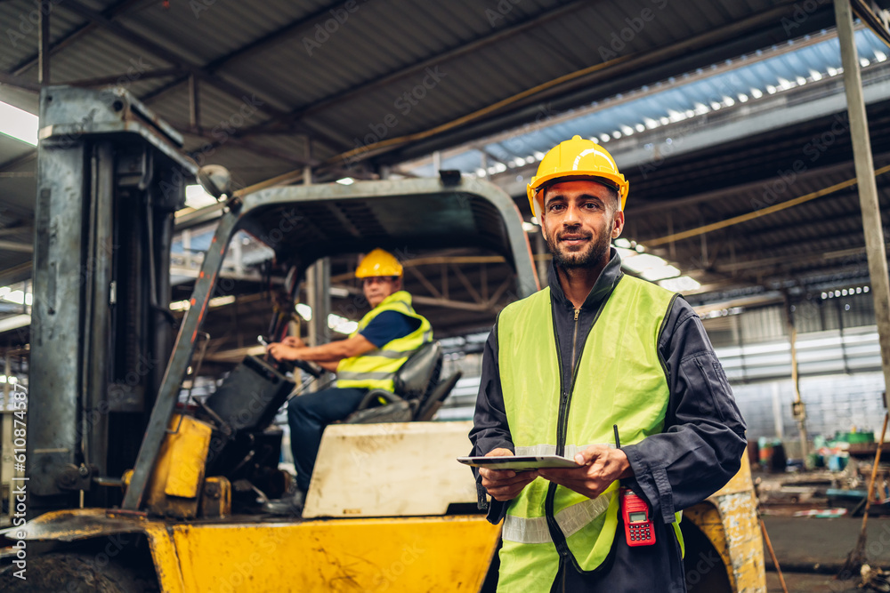 Workers Factory or Engineering work at factory site check up machine or products in site. Foreman or Technician checking Material or Machine on Plant. Heavy industry factory concept. Workers Factory or Engineering work at factory site check up machine or products in site. Foreman or Technician checking Material or Machine on Plant. Heavy industry factory concept.
