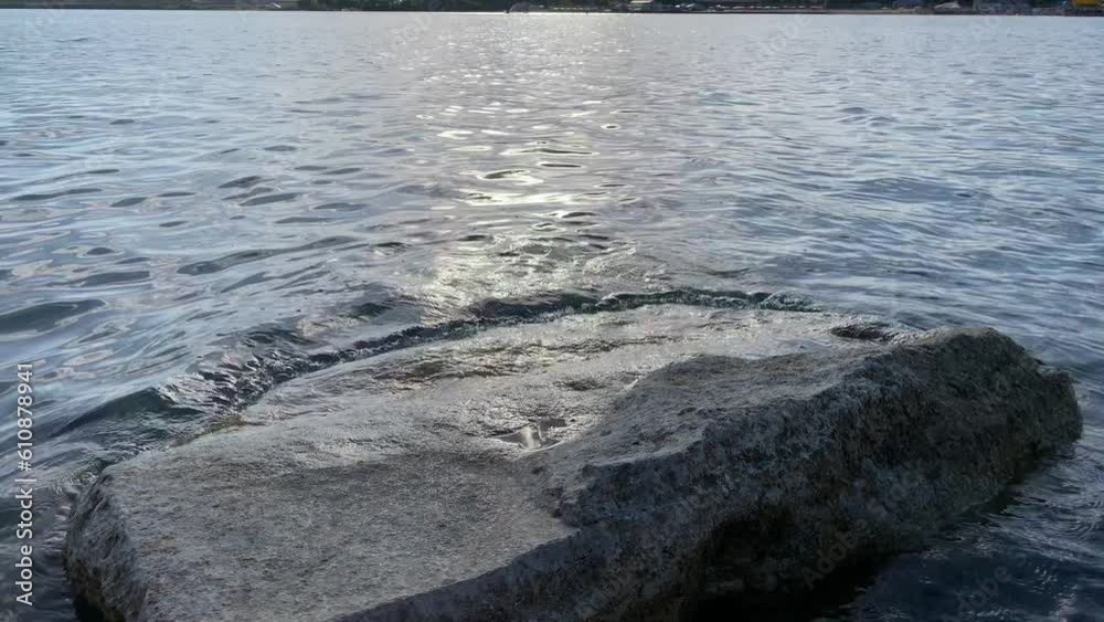 Seascape with rocks and large stones. Sea shore. Stone cliff. Cloudy sky. The beauty of the wild Seascape with rocks and large stones. Sea shore. Stone cliff. Cloudy sky. The beauty of the wild