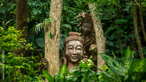 Sculpture hidden in the vegetation truth sanctuary in Pattaya, Thailand.