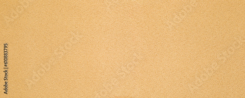 Close-up of golden fabric texture background