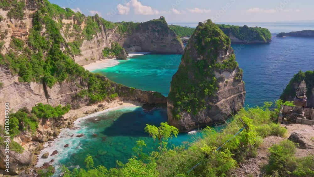 Amazing top view coastline tropical beach with crystal clear azure sea water and mountain cliff in ocean on nature background 4K Amazing top view coastline tropical beach with crystal clear azure sea water and mountain cliff in ocean on nature background 4K