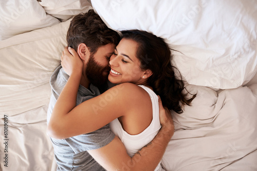 Foto Home bedroom, affection and happy couple hug, relax and enjoy relax morning together, bonding and smile