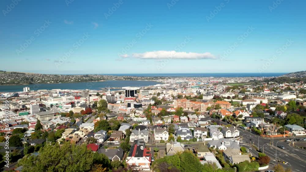 Dunedin, New Zealand. Aerial wide shot of city and Otago Peninsula. South Island cityscape. Dunedin, New Zealand. Aerial wide shot of city and Otago Peninsula. South Island cityscape.