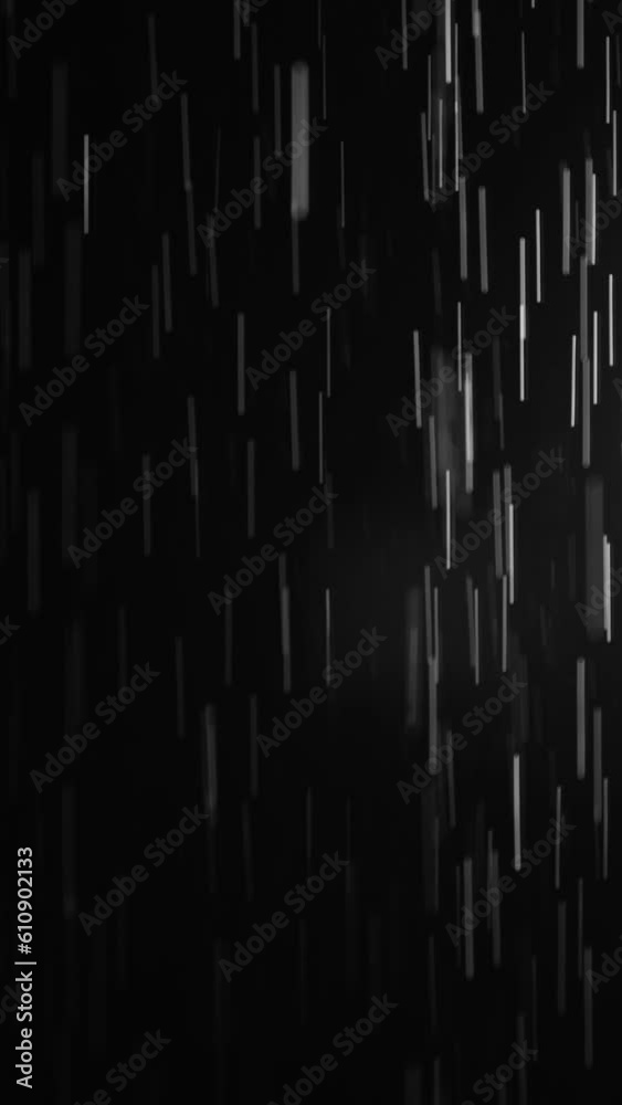 vertical video. Trickles of water on a black background vertical video. Trickles of water on a black background