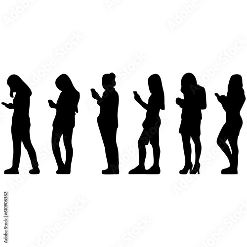 silhouette of woman standing playing mobile phone