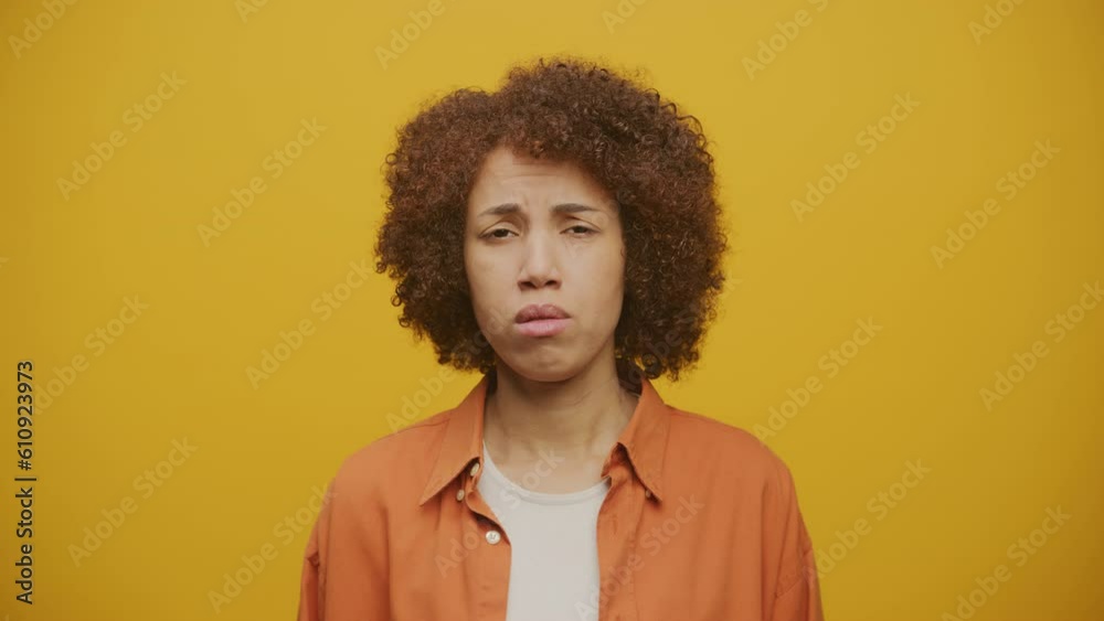 Woman Disagree on Yellow Background, Female No Gesture Woman Disagree on Yellow Background, Female No Gesture