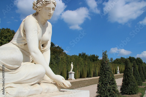 allegorical or mythological statues in the gardens of the castle of versailles (france)