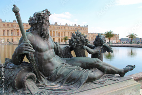 allegorical statue of the river seine at the castle of versailles (france)