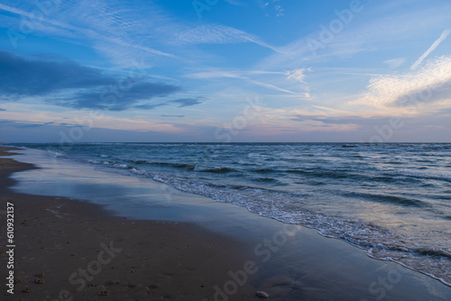Walk in the evening on the beach of the Dutch North Sea near Egmond aan Zee/NL © fotografci