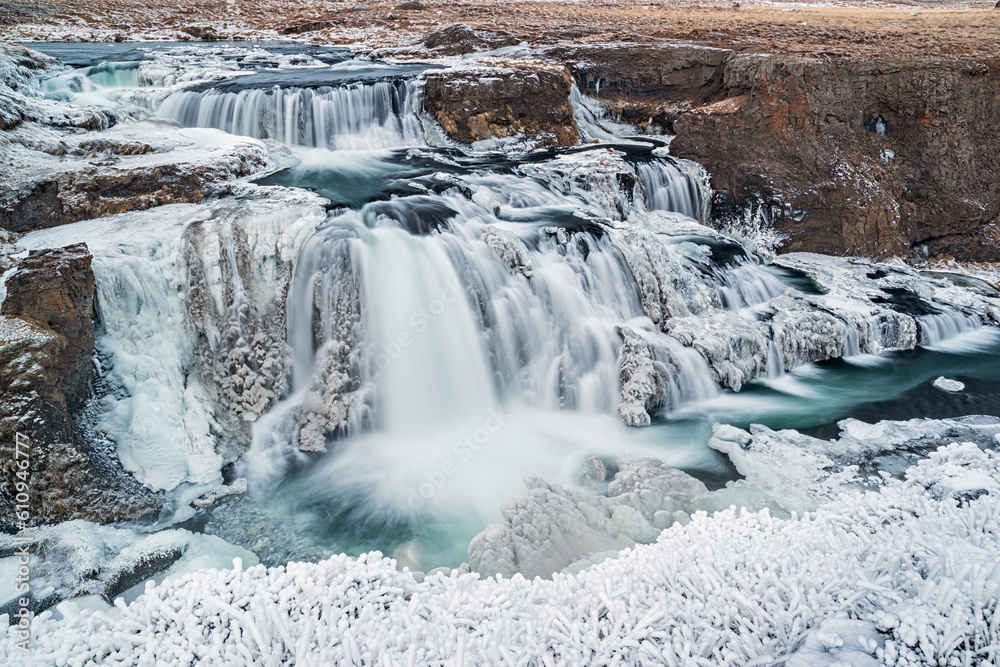 Panoramic view of Reykjafoss waterfall. Varmahlid river in Northern Iceland in winter Panoramic view of Reykjafoss waterfall. Varmahlid river in Northern Iceland in winter