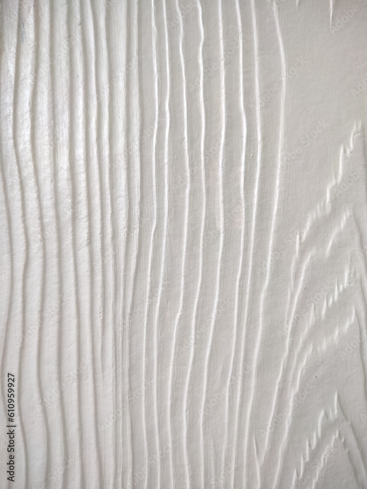 Fototapeta premium The surface of the wooden planks is painted white to create the fence.