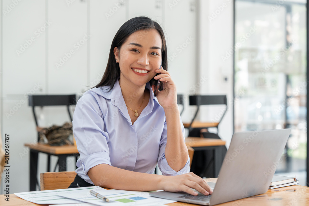 Portrait of happy young office assistant working remotely online sitting with laptop. Portrait of happy young office assistant working remotely online sitting with laptop.