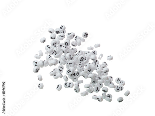 Alphabet letter word plastic bead explode fly in air. Many group of bead screen type font of english letter word in alphabet. White background isolated
