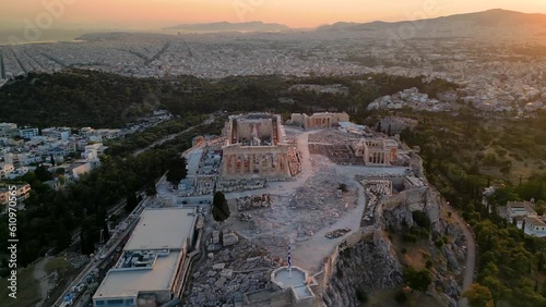 Beautiful aerial sunset view of the Parthenon Temple at the Acropolis of Athens, Greece, with soft sunlight relfected from the marble columns photo