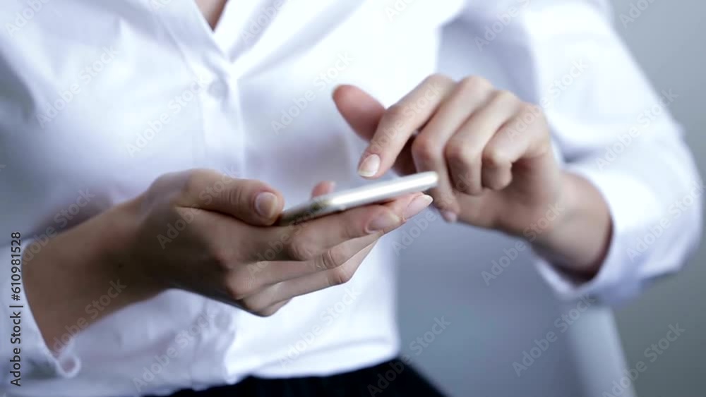 a hand scrolling on the phone a hand scrolling on the phone