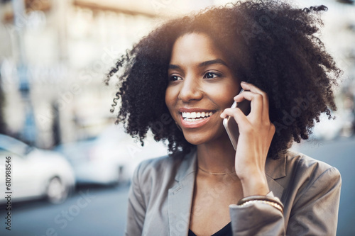 Happy woman, phone call and communication in city for conversation or networking outdoors. African female person talking on mobile smartphone with smile for fun discussion in street of an urban town