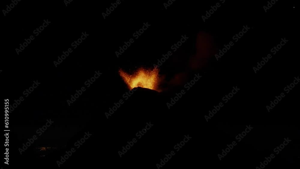 Lava Flowing From Crater Of Fuego Volcano During Eruption At Night In Guatemala. - wide