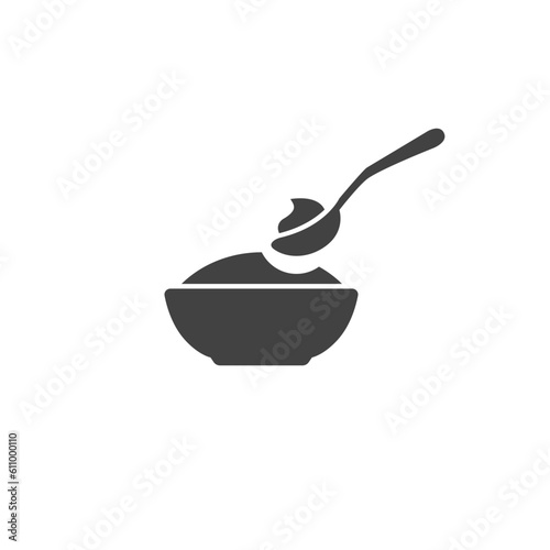 Baby spoon and bowl full of meal vector icon isolated