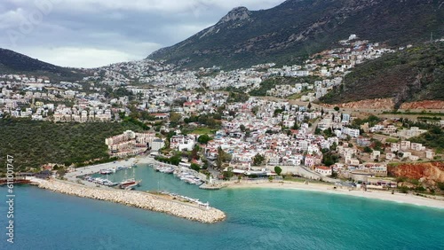 Wallpaper Mural Top view from a drone of city of Kalkan with a blue lagoon, yachts, small houses and narrow streets. Muğla province in Turkey.	 Torontodigital.ca