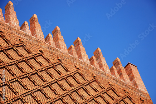 Abstract architectural detail of red brick wall and rood. Michelet Center Art and Archeology library in  Paris, France photo