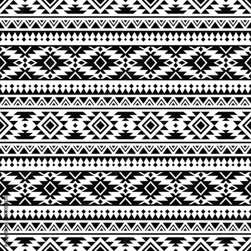 Abstract ethnic geometric background illustration design. Seamless pattern of Aztec tribal. Black and white colors. Design for textile, fabric, clothing, curtain, rug, ornament, wallpaper, wrapping.