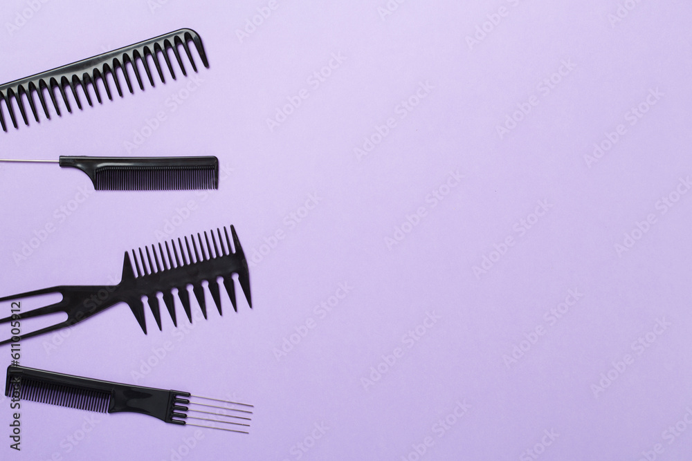 Professional combs and hairdresser tools on color background, top view Professional combs and hairdresser tools on color background, top view