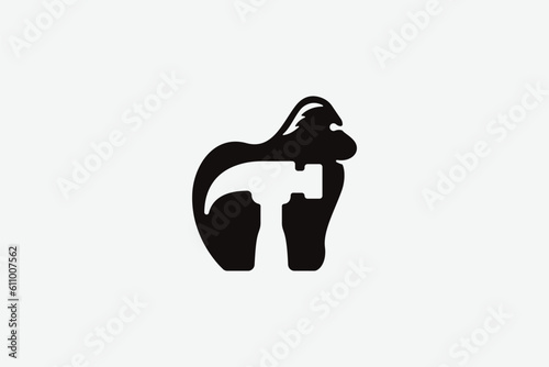 Creative logo design designated to construction company or workshop. This logo design depicts a gorilla with a hammer in the negative space. 
