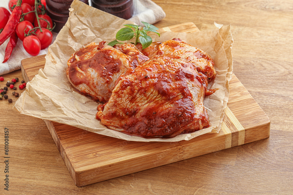 Marinated chicken leg in tomato sauce