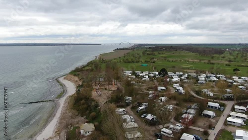 Spektakulärer Drohnenflug: Blick auf den Strand, die Ostsee und die Fehmarnsundbrücke von der Insel Fehmarn photo