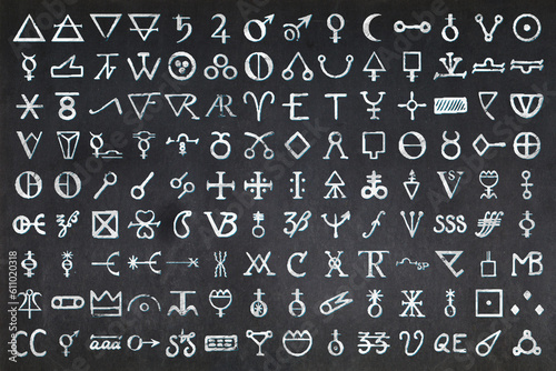 Hundreds of glyphs used in Alchemy drawn on a Blackboard