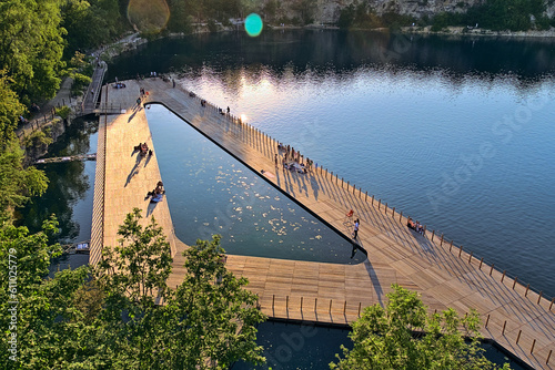 Floating swimming pool in old quarry.