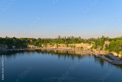 Floating swimming pool in old quarry.