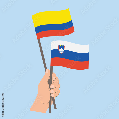 Flags of Colombia and Slovenia, Hand Holding flags