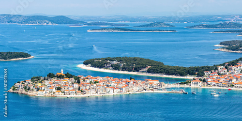 Primosten town on a peninsula vacation in the Mediterranean Sea panorama in Primošten, Croatia photo