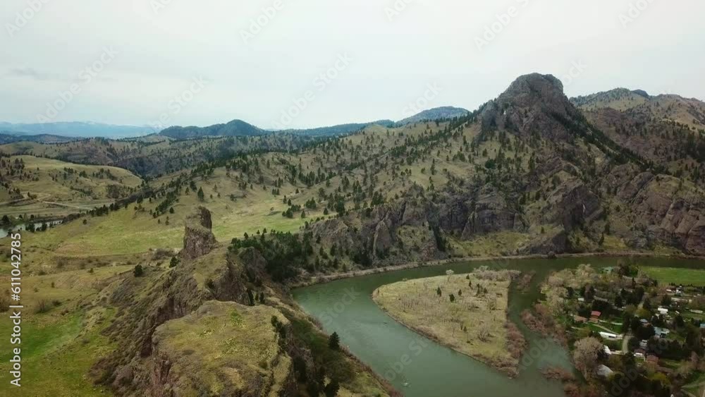 Aerial Shot Of River Passing By Rocky Cliff Against Sky, Drone Flying Over Landscape - Billings, Montana Aerial Shot Of River Passing By Rocky Cliff Against Sky, Drone Flying Over Landscape - Billings, Montana