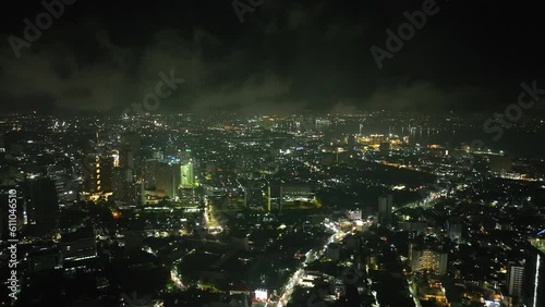 Wallpaper Mural Midnight shot of skyscraper in Cebu City. Philippines. Full night. Bright street lights. Torontodigital.ca
