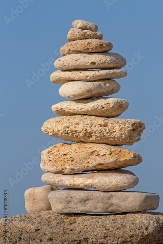 tower made of stones against blue sky