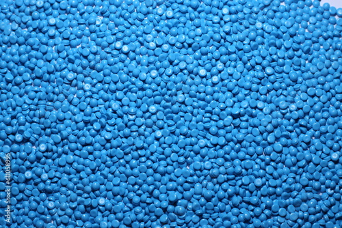 Blue of plastic polymer granules.