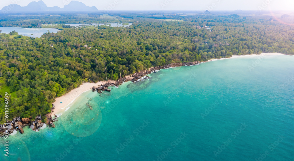 beautiful landscape of an island in thailand by day with crystal clear water aerial view