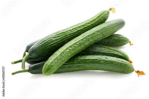 Heap of fresh cucumbers isolated on white background