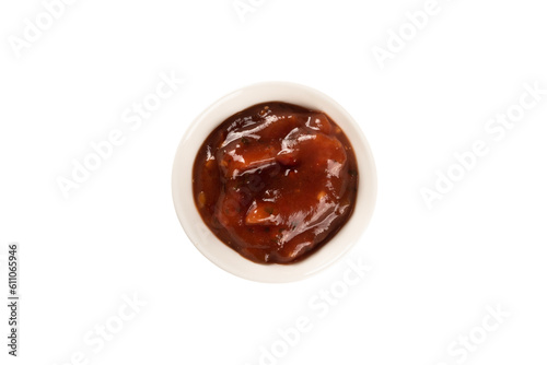 Bowl with red sauce isolated on white background