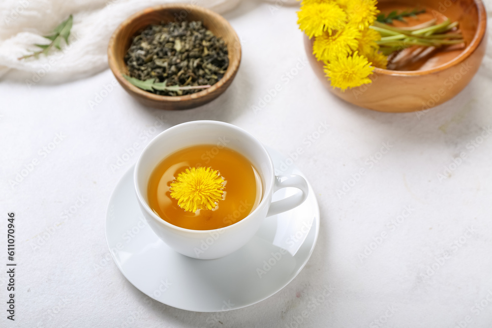 Cup of healthy dandelion tea on white background Cup of healthy dandelion tea on white background