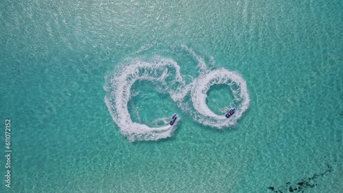 Sailing in circles on a jet ski on the sea photo